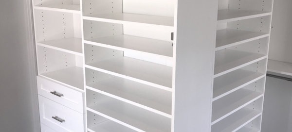 WALK IN CLOSET WHITE SHAKER OUTSIDE CORNER SHOE SHELVES